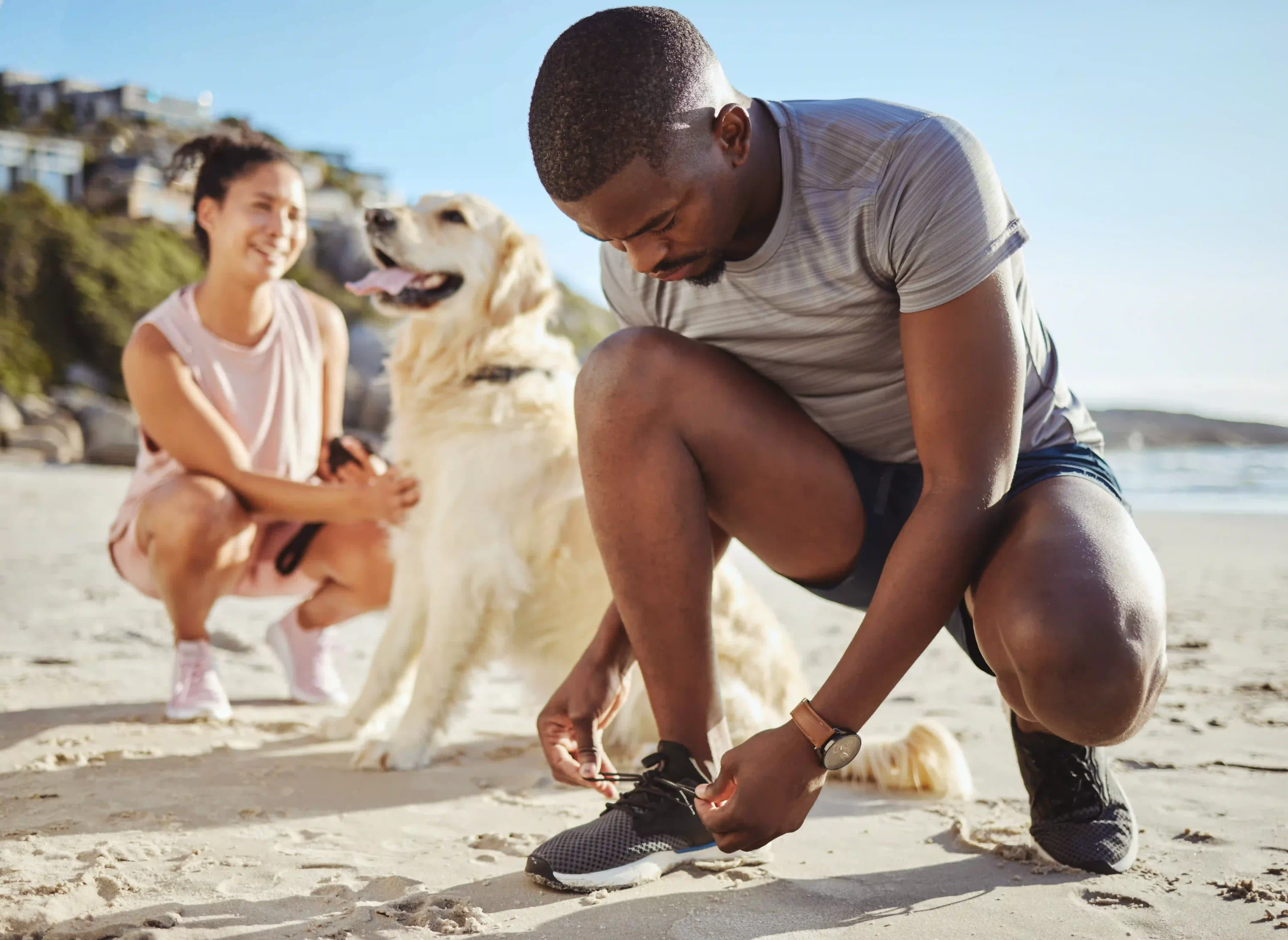 Man and woman working out with dog. Dog workouts. Pets24
